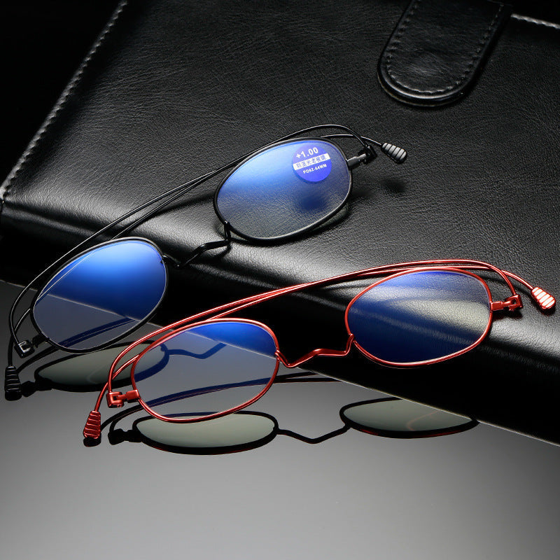 Original black and red frames showing titanium rims, shaped bridges and ribbed tips