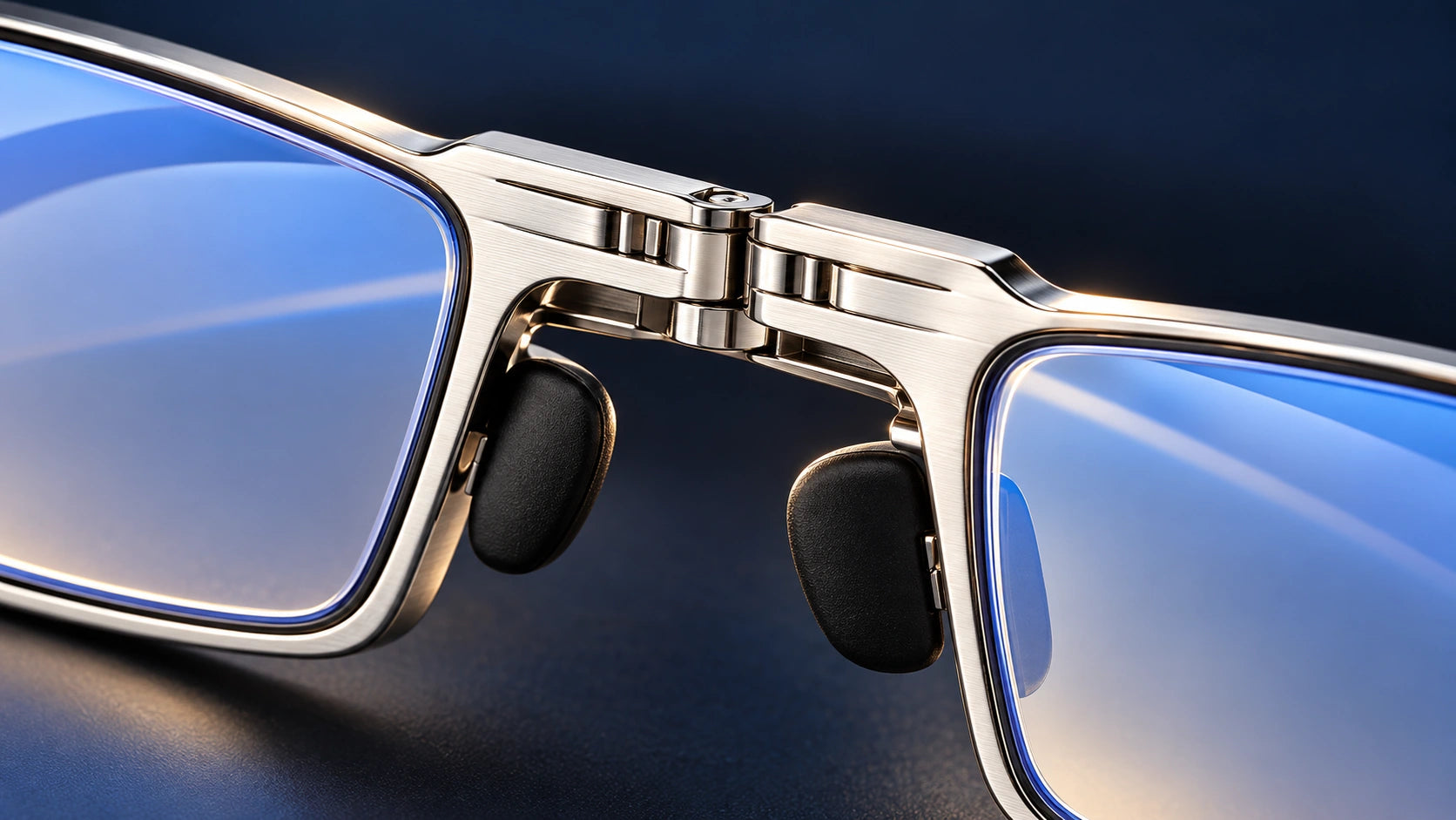 Illustrative high-resolution detail of the silver titanium frame bridge, lens rim and soft nose pad