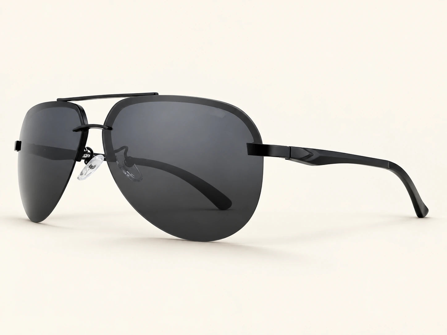 Black Aero-Alloy sunglasses with smoke lenses on a warm ivory surface, generated product visualization
