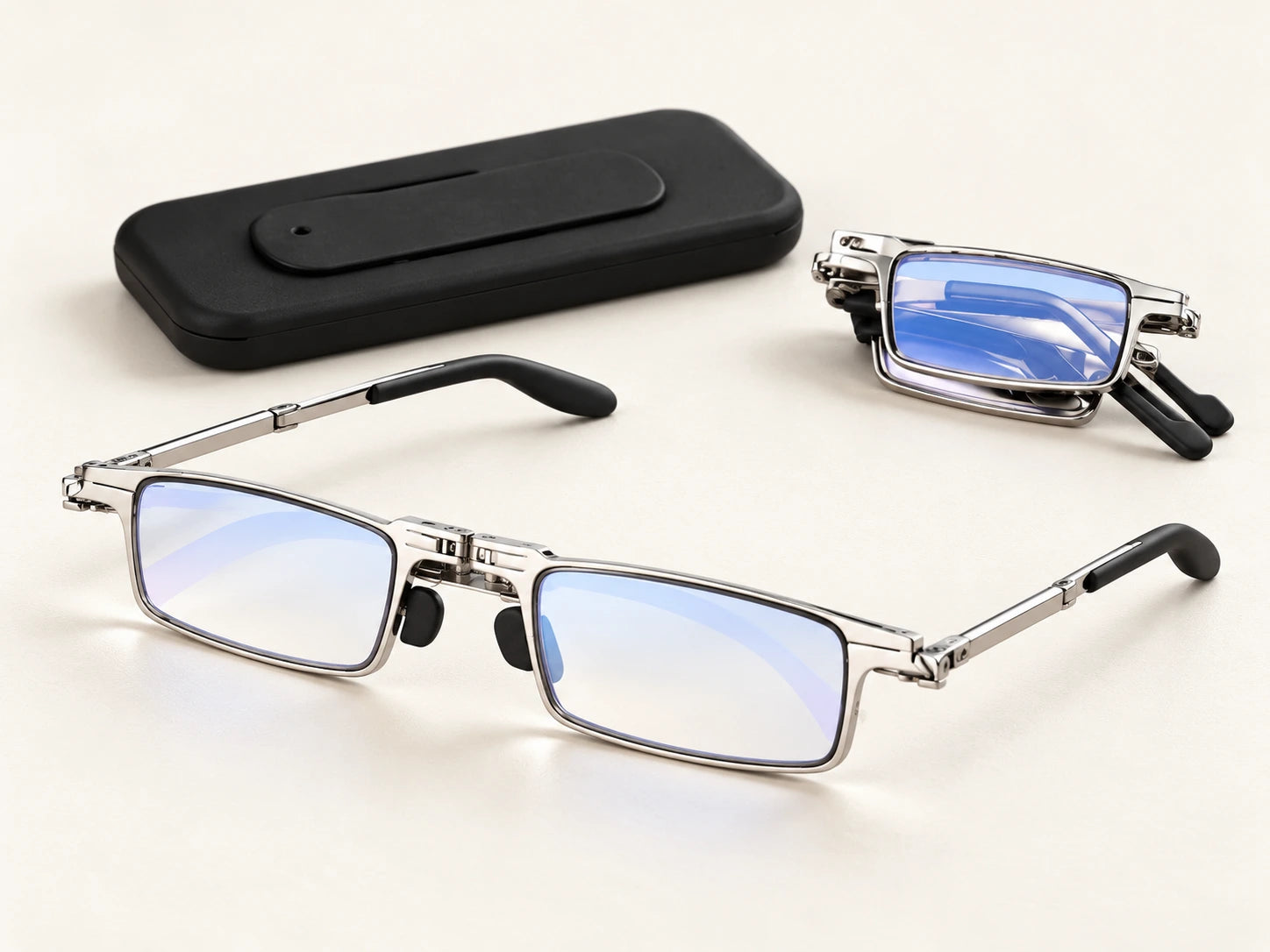 Foldable reading glasses and compact carrying attachment