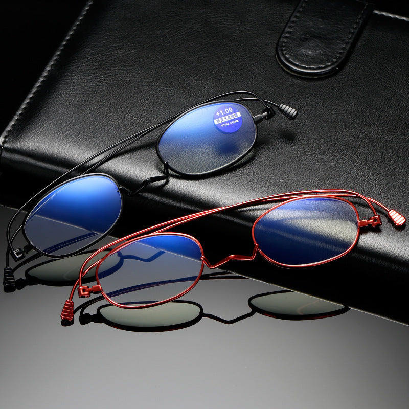 Original black and red frames showing titanium rims, shaped bridges and ribbed tips