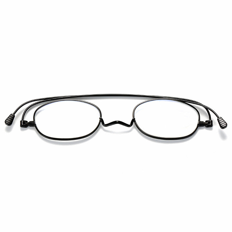 Original black frame with the temples resting flat behind the lenses